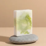 coconut soap bar on pebble. mimimalist spa 1
