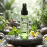 Lemon peppermint foot spray on pebble