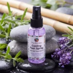 lavender foot spray on wet pebbles