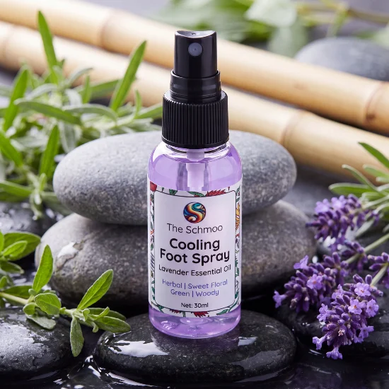lavender foot spray on wet pebbles