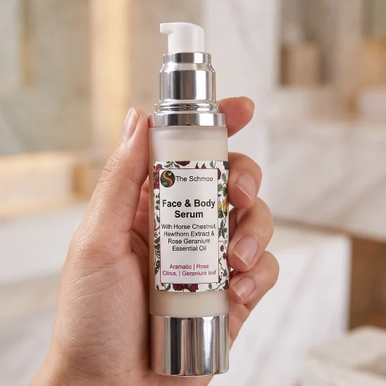 serum rose geranium in a hand