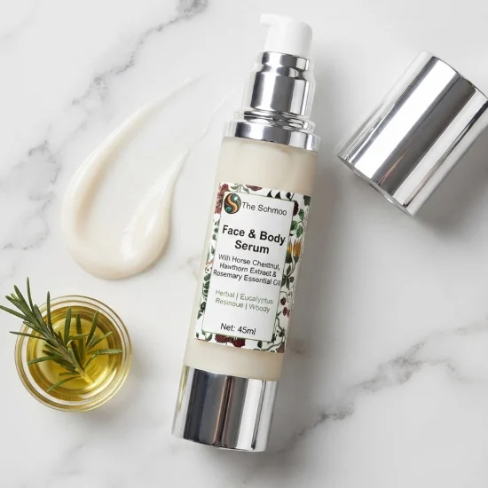 serum rosemary flat lay on marble