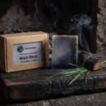 black citrus soap bar on ashy wood black citrus soap bar on ashy wood