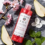 cherry blossom liquid soap flat lay