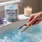 bath salts lavender hand dropping salt in bath bath salts lavender hand dropping salt in bath