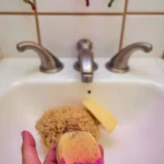 light bath bomb held in hand #1 Christmas Light Bath Bomb | Our Top-Rated Holiday Treat